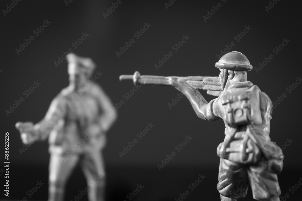 Mini toy soldier on black background Mini toy soldier on black background