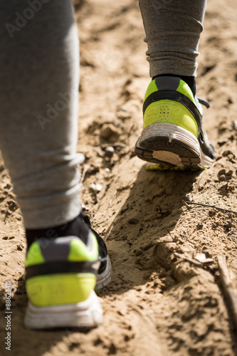 Feet in running shoes