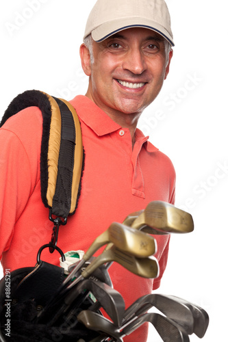 Male golfer carrying his bag