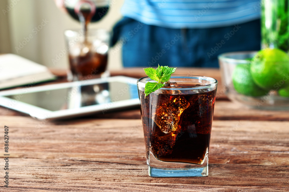 glass of cola with ice and mint glass of cola with ice and mint