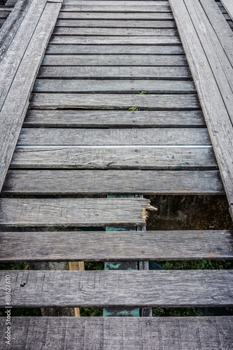 Damaged old wooden bridge for weak point concept