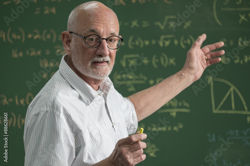 Male professor teaching in class photo