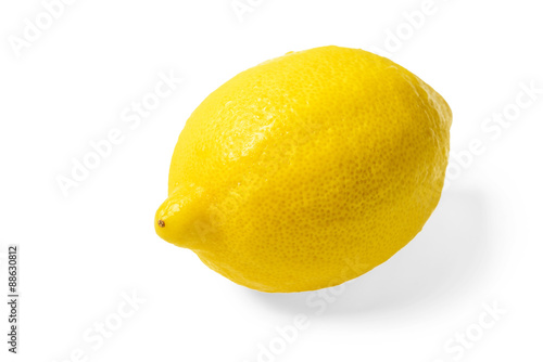 single fresh lemon on white