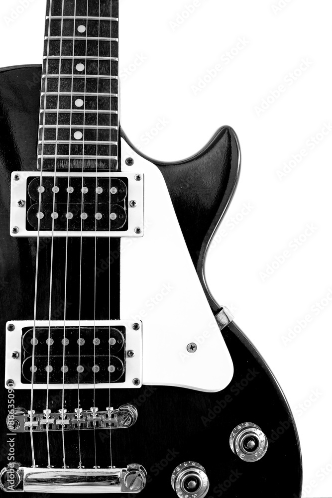 Fototapeta premium black and white electronic guitar isolated on white background