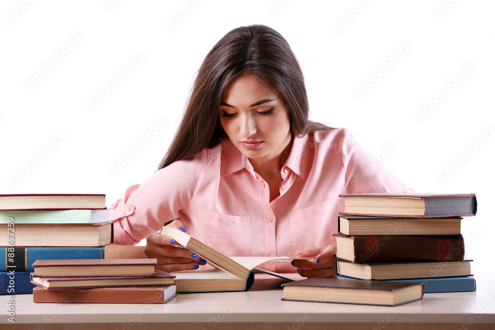 Young girl reading book isolated on white Young girl reading book isolated on white
