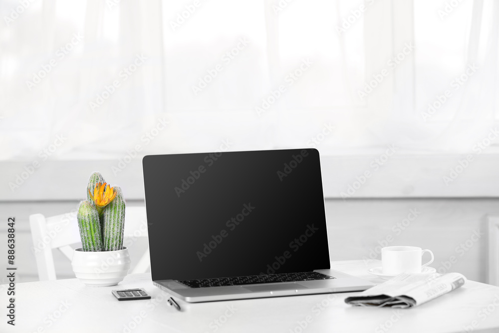 Modern workplace with laptop, close up Modern workplace with laptop, close up