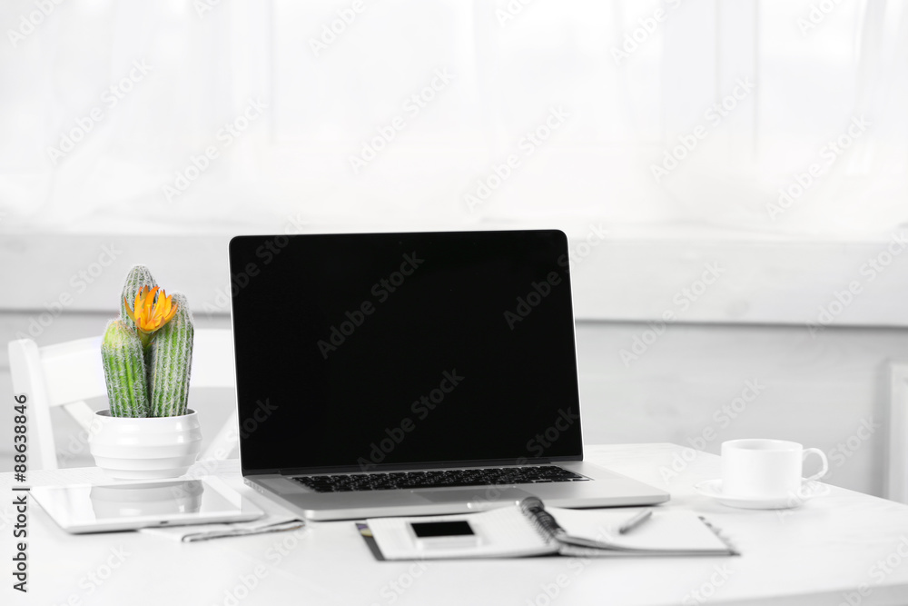 Modern workplace with laptop, close up Modern workplace with laptop, close up