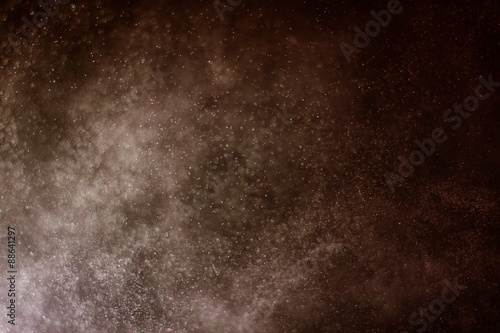 abstract dark bokeh lights background ,  defocused background, glowing galaxy
