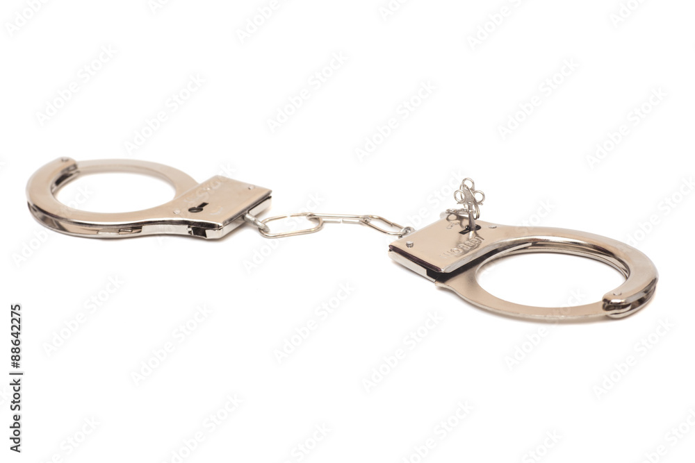 Handcuffs isolated on white background Handcuffs isolated on white background