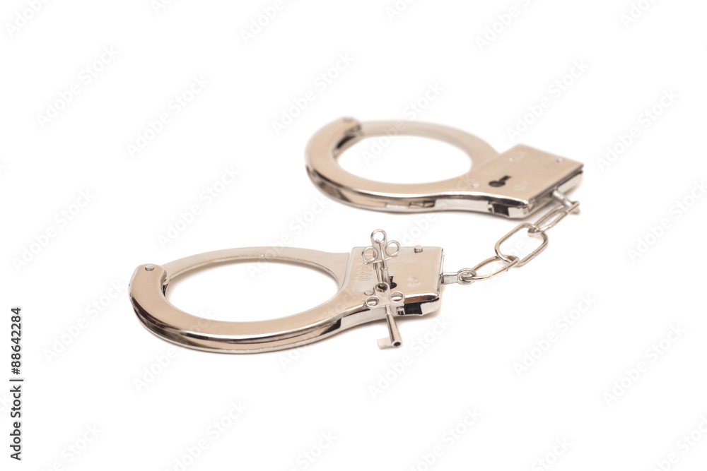 Handcuffs isolated on white background Handcuffs isolated on white background