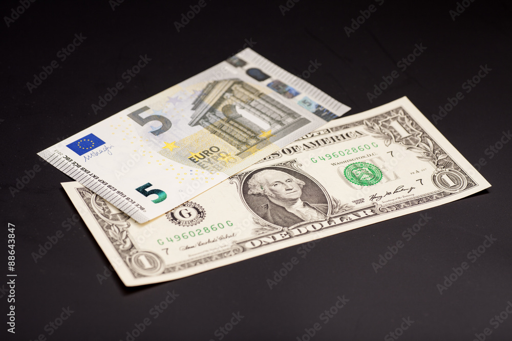 dollar and euro money isolated on black dollar and euro money isolated on black