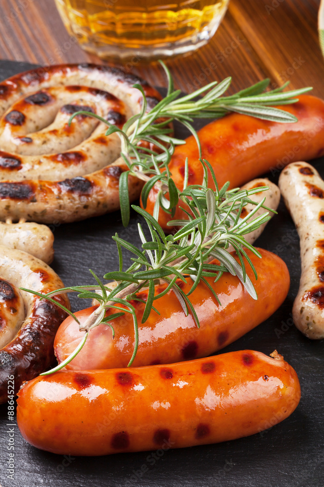Grilled sausages and beer mug Grilled sausages and beer mug