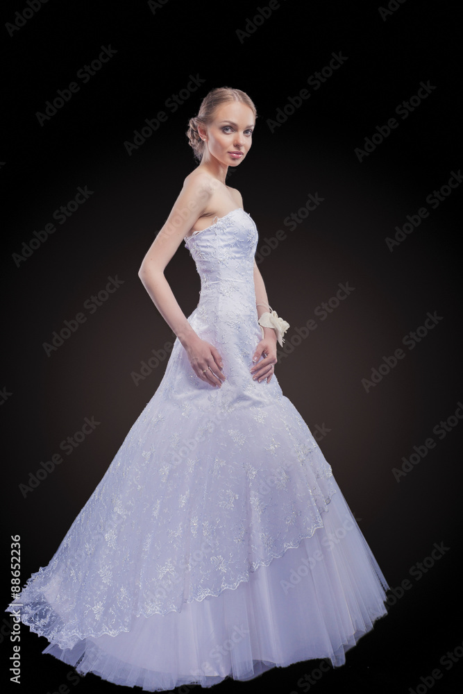 Portrait of Caucasian Bride Posing in Gorgeous Wedding Dress Mad Portrait of Caucasian Bride Posing in Gorgeous Wedding Dress Mad