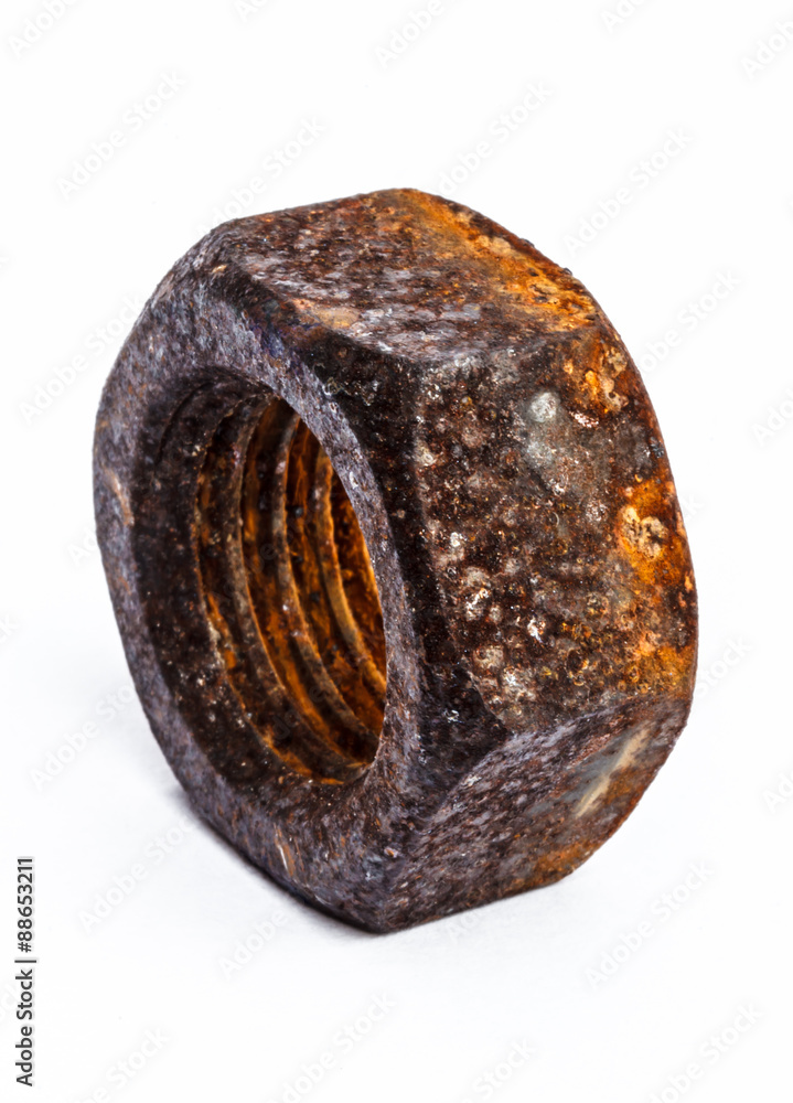 Fototapeta premium Old rusty nut on white background