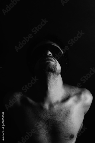 Wallpaper Mural Young naked man with  bandage on eyes Torontodigital.ca