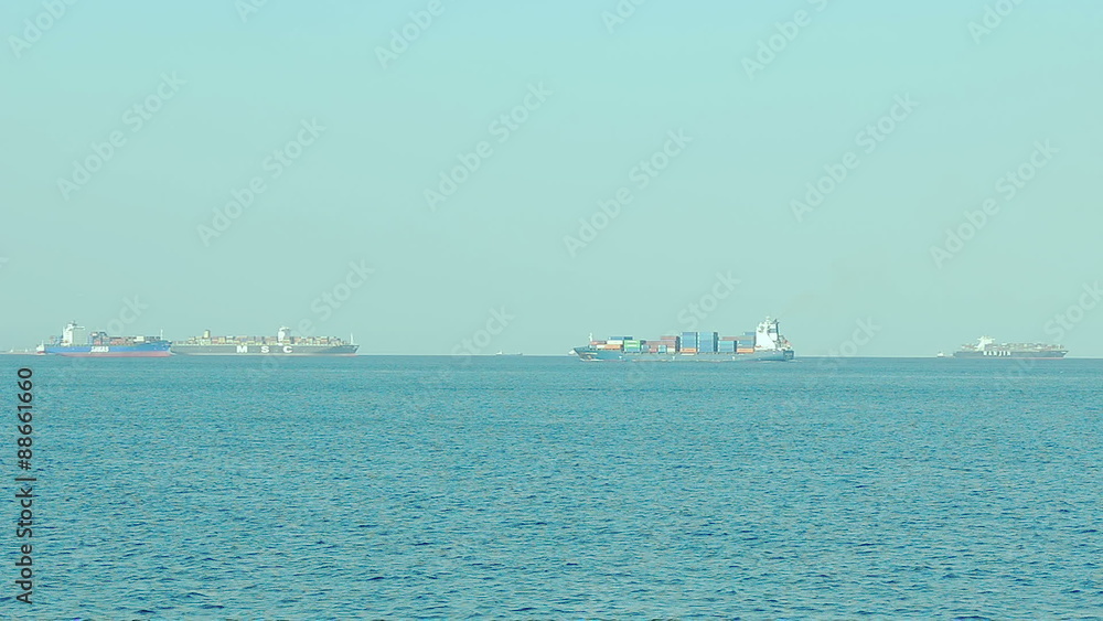 Many loaded cargo container ships Many loaded cargo container ships