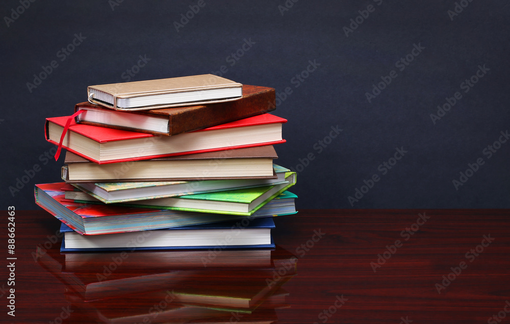 Back to school. An apple, colored pencils and glasses on pile
Back to school. An apple, colored pencils and glasses on pile