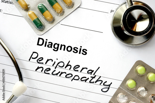 Diagnosis  Peripheral neuropathy, pills and stethoscope. photo