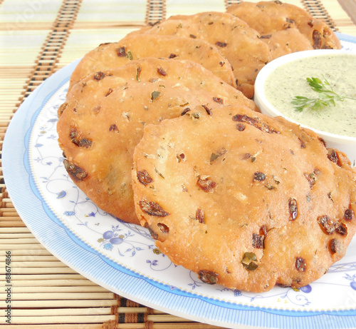Maddur vada, an Indian deep fried snack, which is typically eaten with coconut chutney.