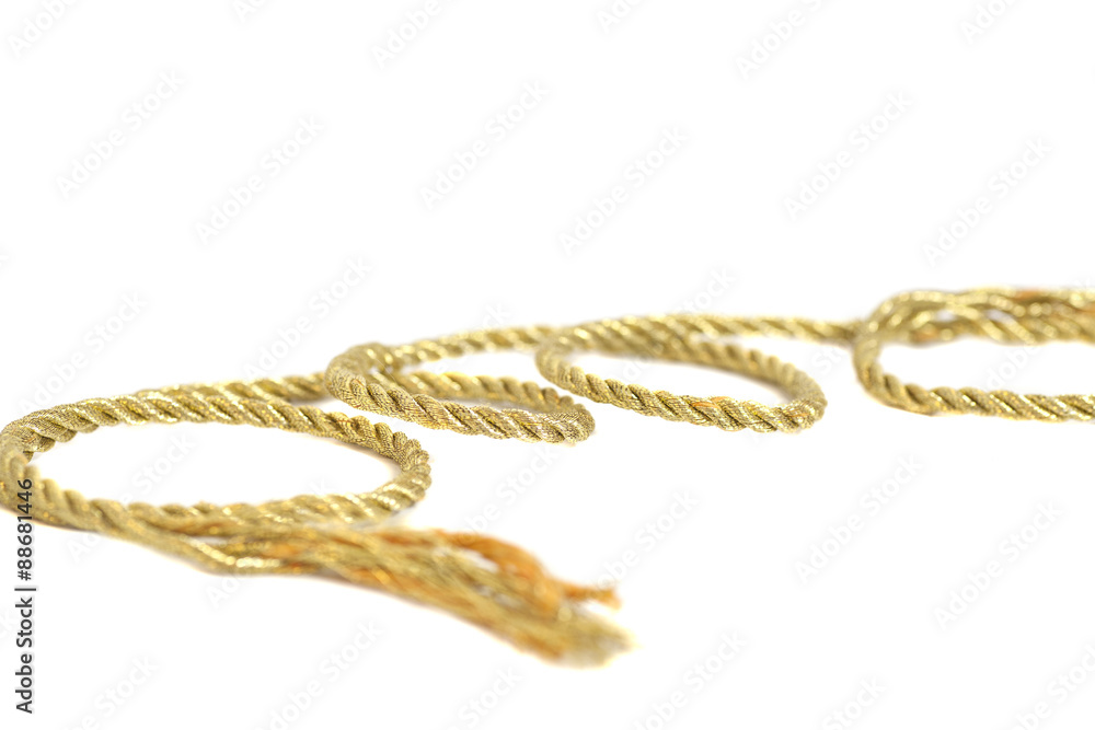 Golden rope isolated on white background