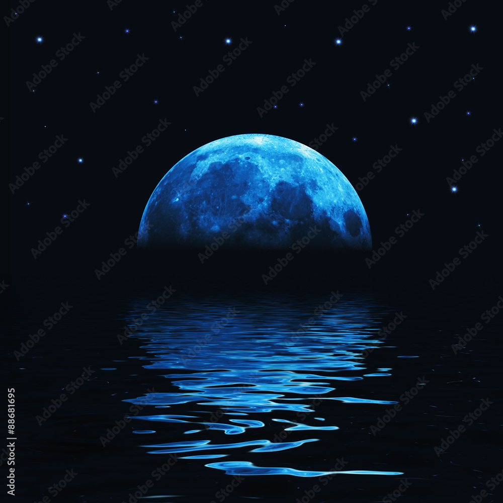 Naklejka premium Big blue moon reflected in water