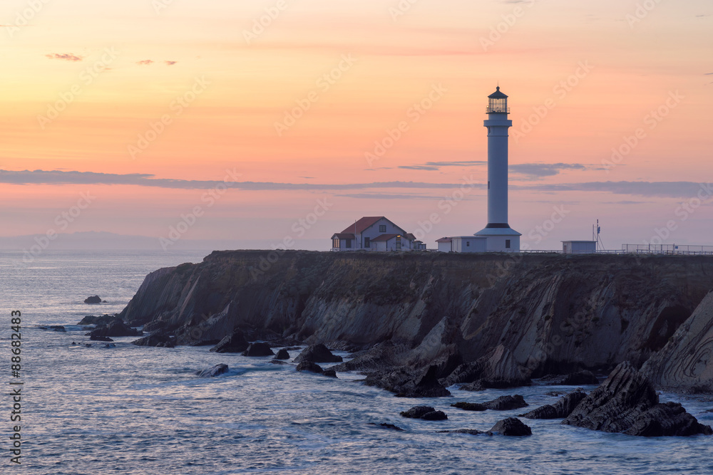 Point Arena Lighthouse at sunset in California county, USA