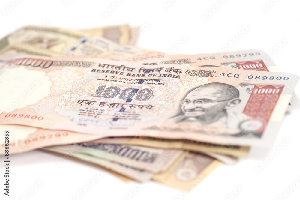 Indian Currency Rupee bank notes on white background Indian Currency Rupee bank notes on white background
