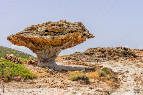 Skiadi stone - a giant lump in the shape of a mushroom, a unique natural attraction of the island of Kimolos, Cyclades, Greece. photo