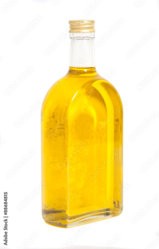 Oil In Glass Bottle On A White Background
