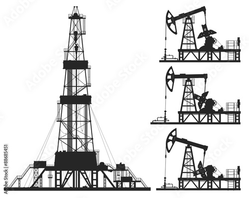 Set of oil pumps and rig silhouettes photo