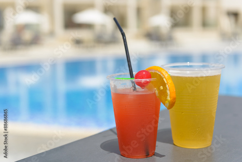 Poolside happy hour cocktails at an all inclusive resort hotel.