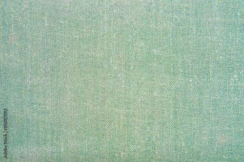 Background texture with old green textile.