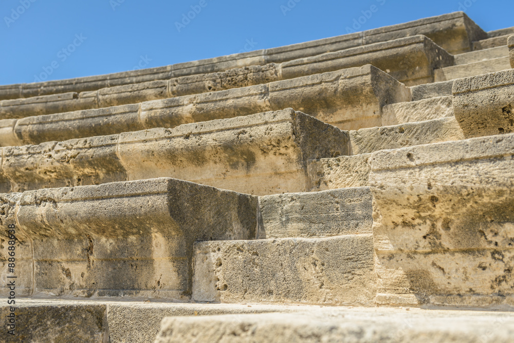 Steps of ancient stone amphitheater ruins in Paphos, Cyprus.