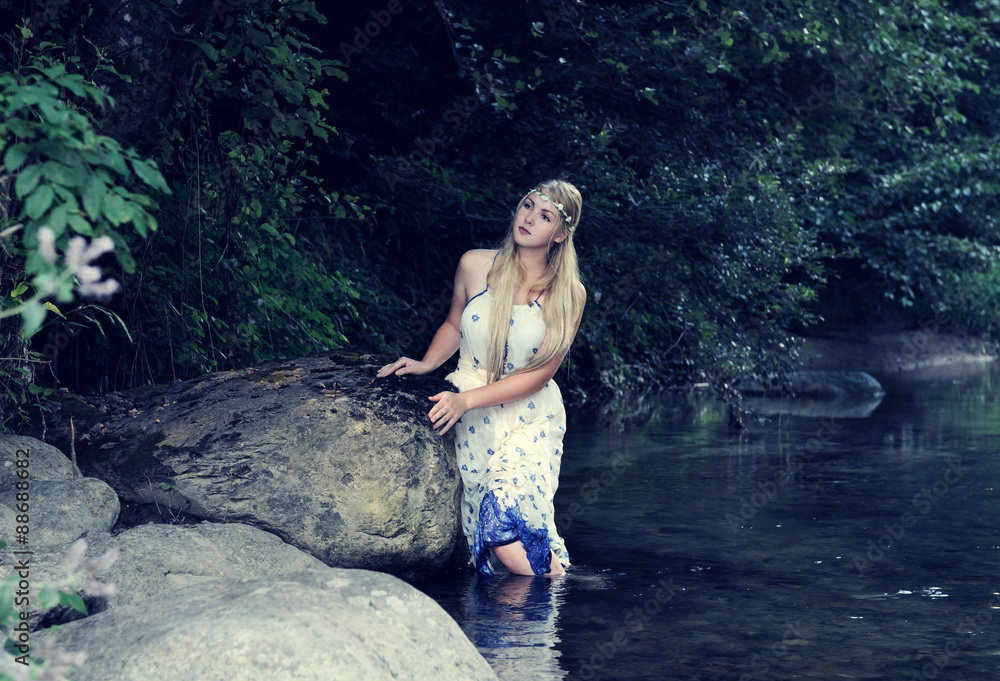 Fototapeta premium beautiful girl in the river