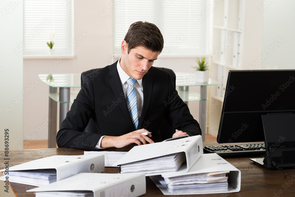 Businessman Doing Accounting Businessman Doing Accounting