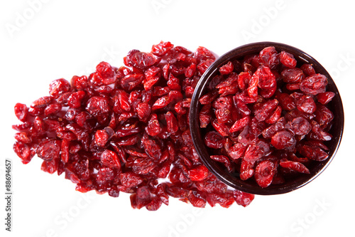 Dry cranberry on white wooden table