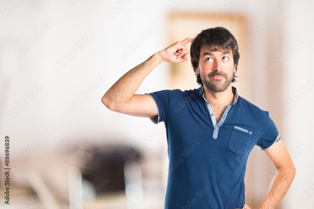 Man thinking over isolated white background Man thinking over isolated white background