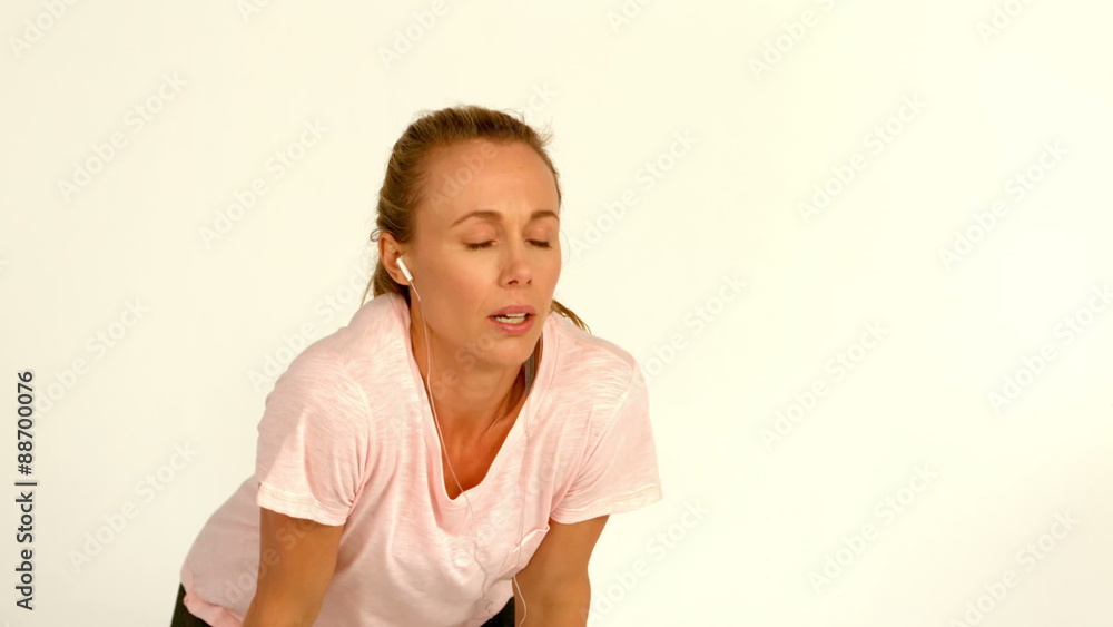 Exhausted female runner taking a break Exhausted female runner taking a break