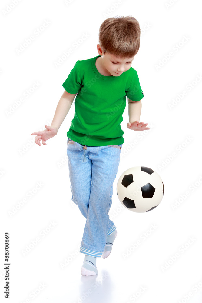 boy plays football