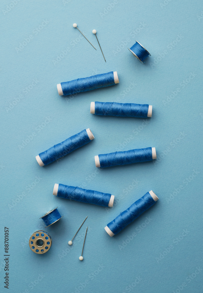 Naklejka premium Blue thread spools