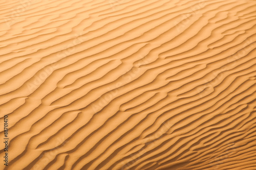 Sand dunes texture in desert