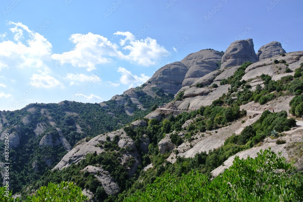 Fototapeta premium Strange rugged landscape of the Montserrat mountain located close to Barcelona in Catalonia, Spain, on a sunny day.