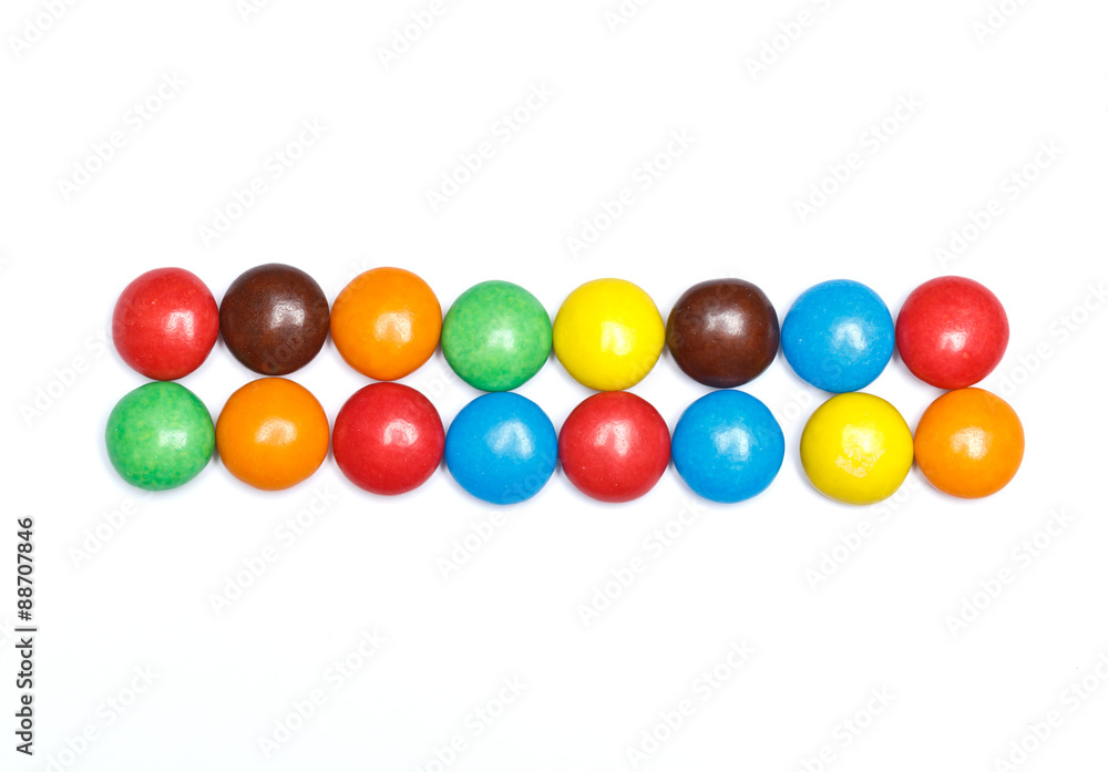 symbol sign dash minus plus of colorful candy on a white backg symbol sign dash minus plus of colorful candy on a white backg