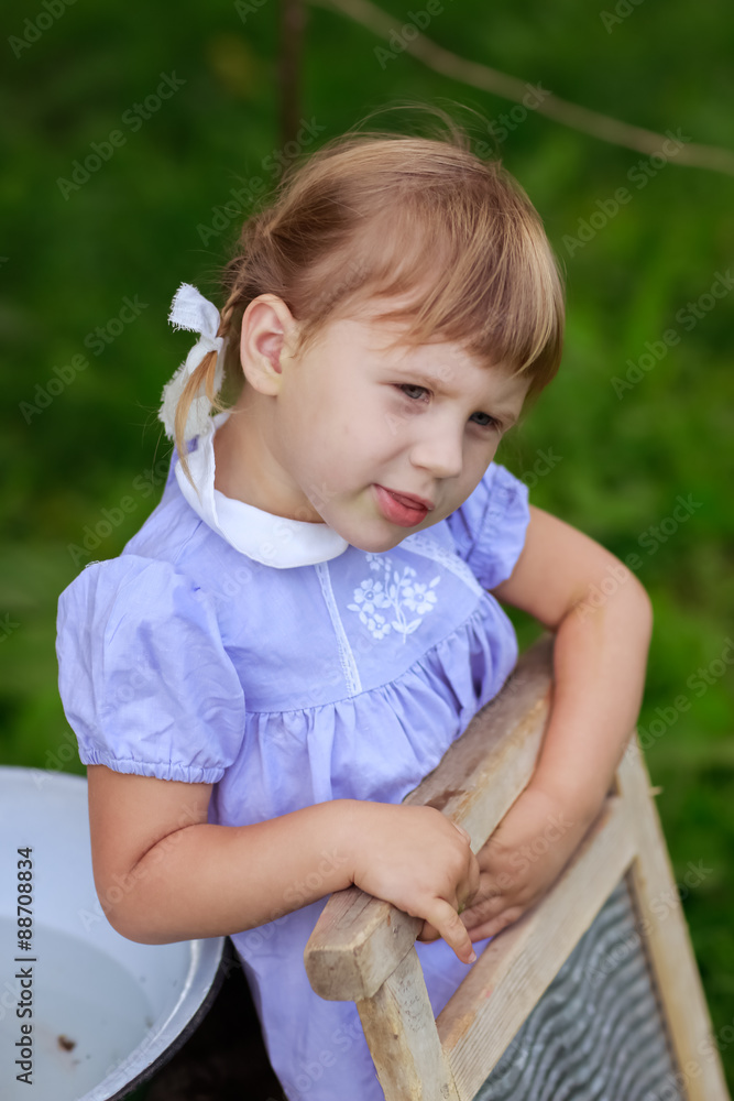 girl with a washboard, a little helper girl with a washboard, a little helper