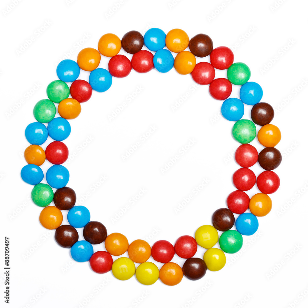 round frame of colorful candy on a white background with space f round frame of colorful candy on a white background with space f