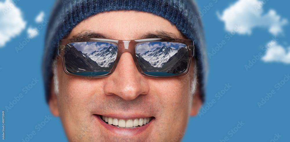 Close up of a man's face wearing sunglasses Close up of a man's face wearing sunglasses
