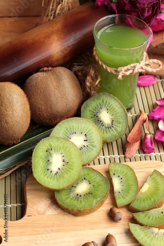 Kiwi fruit juicy green and kiwi juice delicious. photo