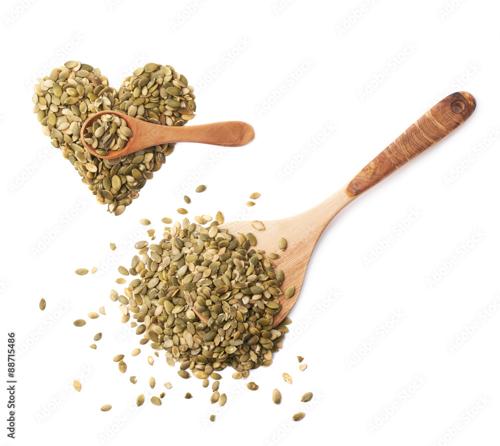Wooden spoon covered with pumpkin seeds Wooden spoon covered with pumpkin seeds