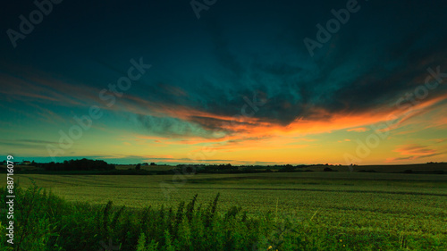 Beautiful sunset on a spring field