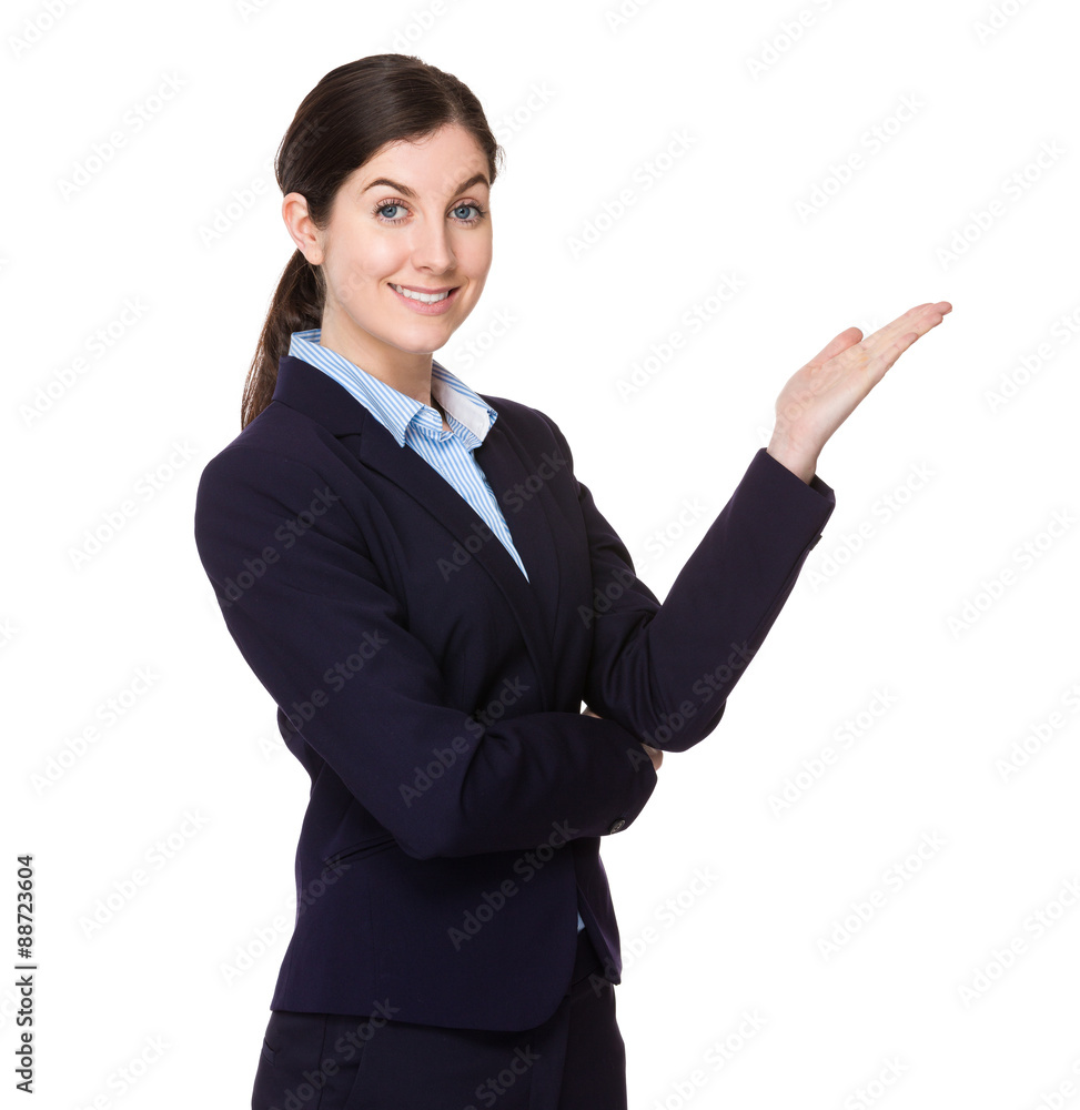 Caucasian businesswoman with hand showing something Caucasian businesswoman with hand showing something